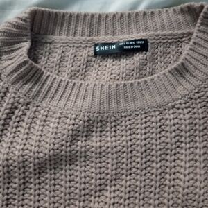 Women's large pants and large crop sweater by Shein.